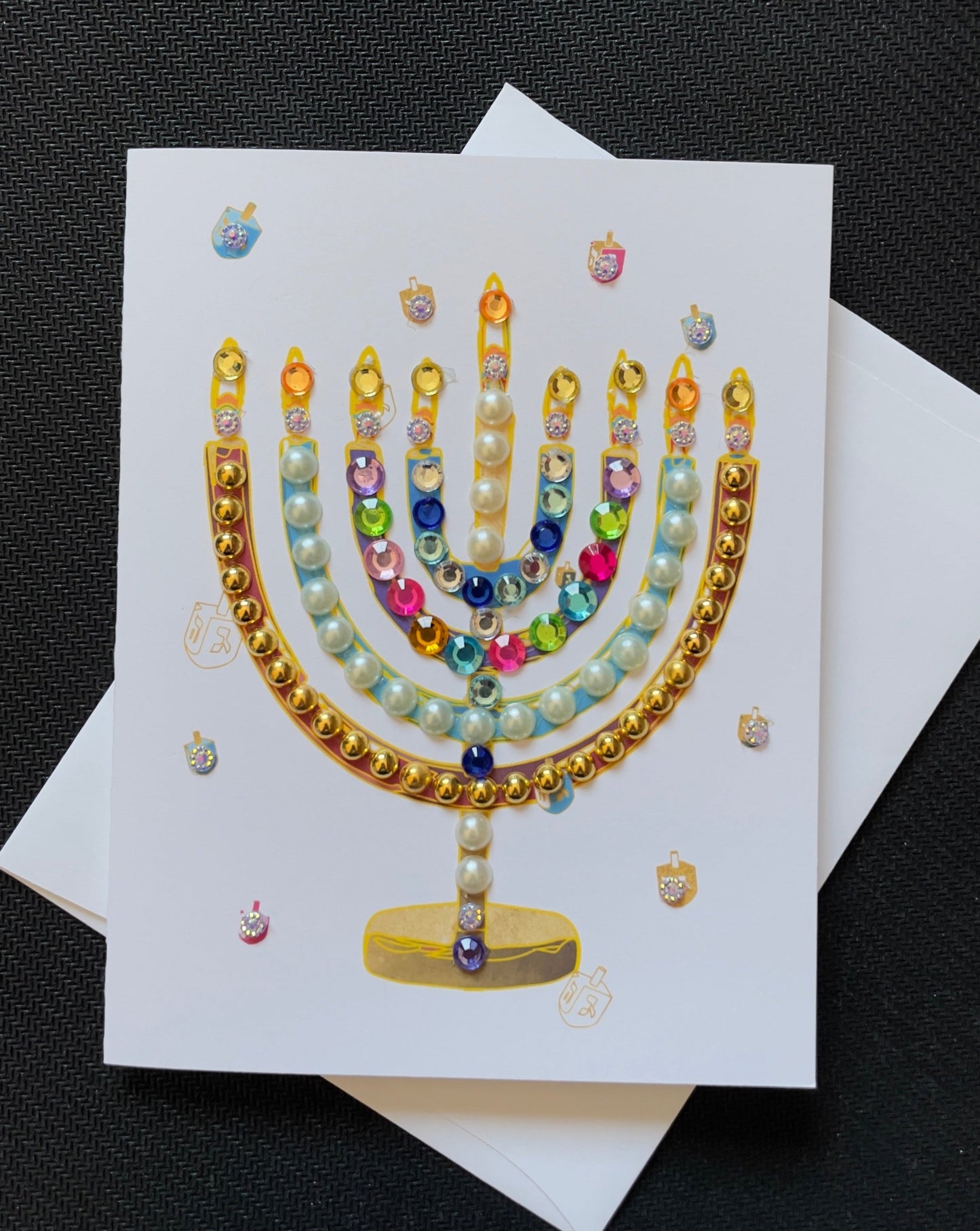 Colourful Menorah with Dreidels Greeting Card