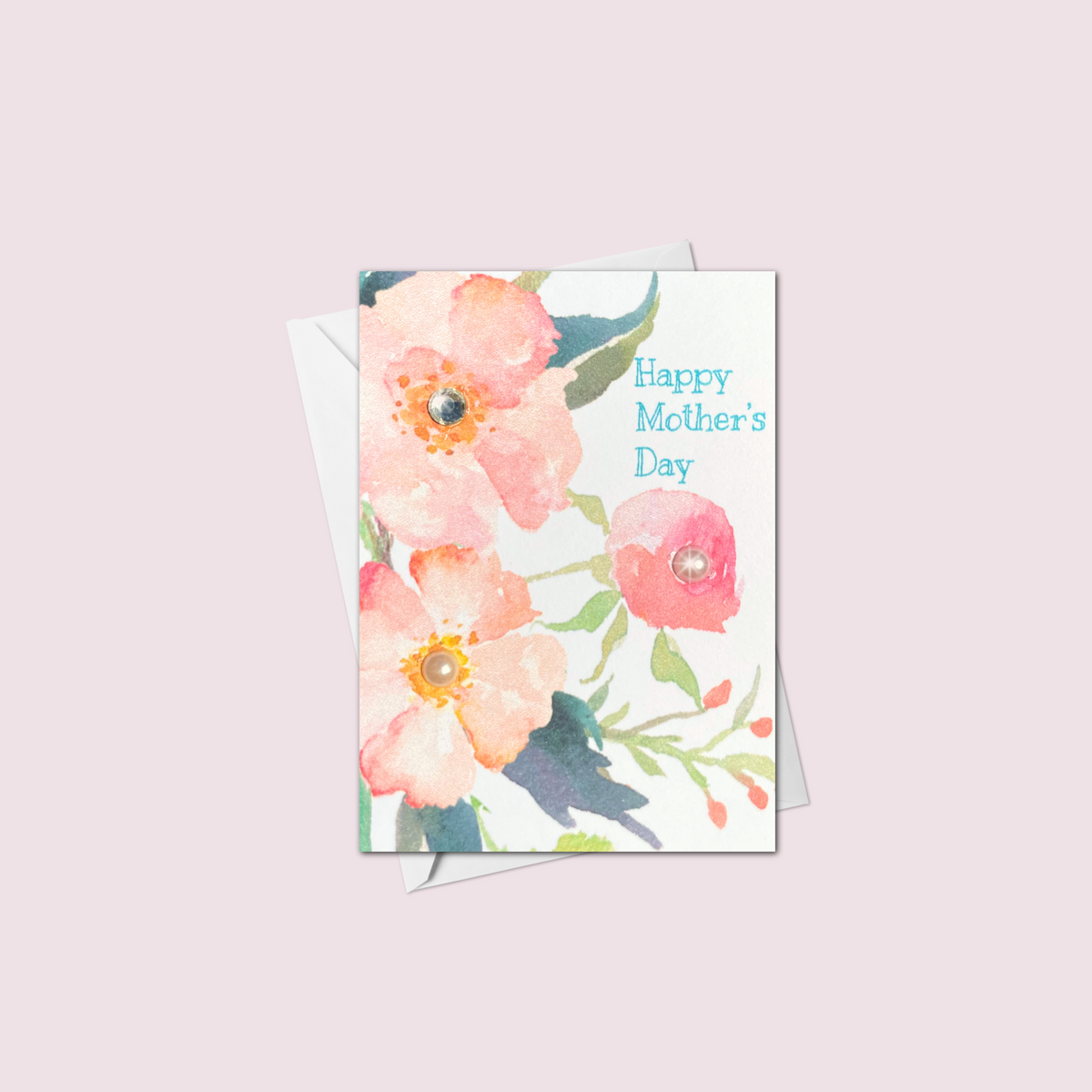Mini handmade Mother's Day card featuring peach and pink watercolor flowers with jewel accents and Happy Mother's Day text in blue, made in Canada.