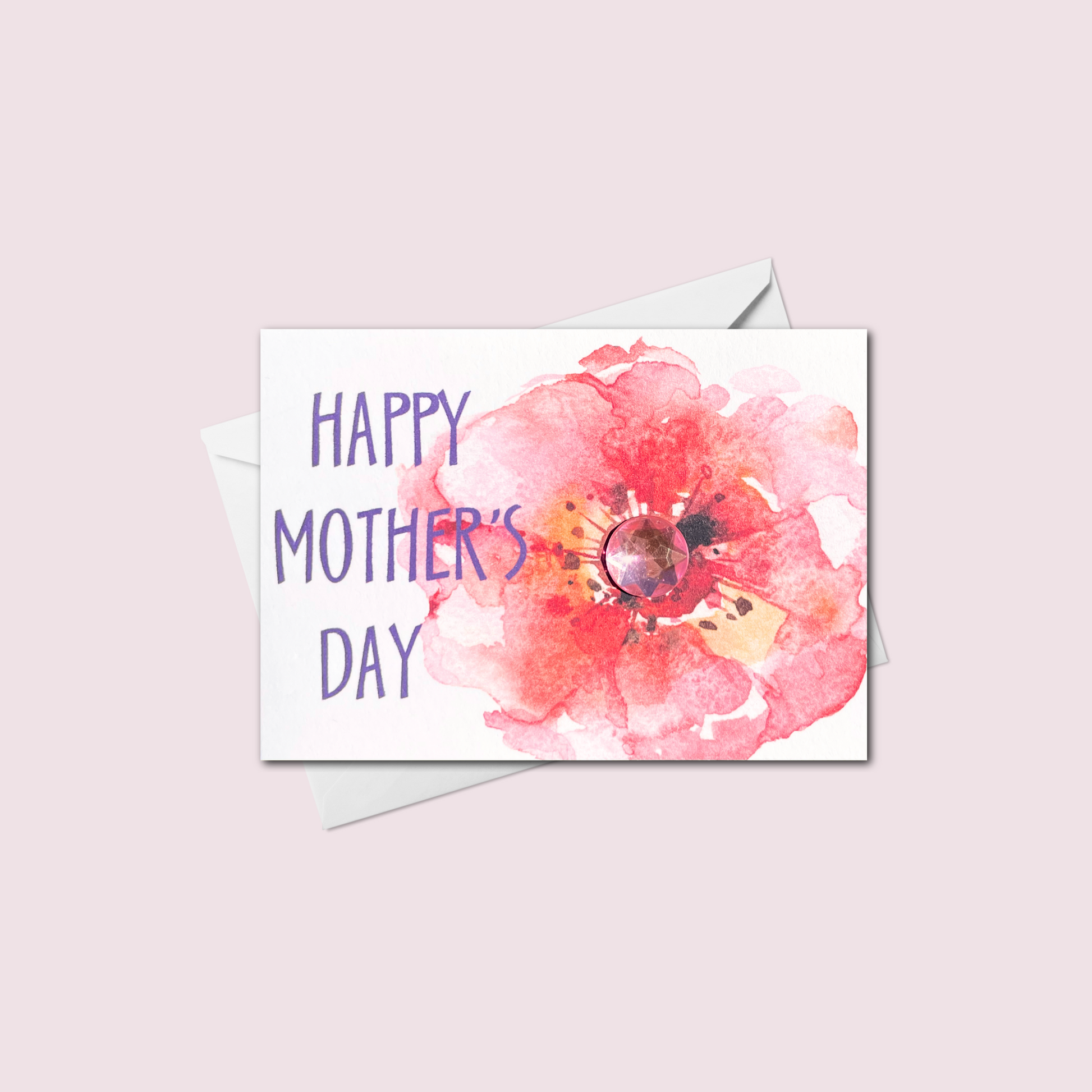 Mini handmade Mother's Day card featuring a pink watercolor flower with a jewel center and Happy Mother's Day text in purple, made in Canada.