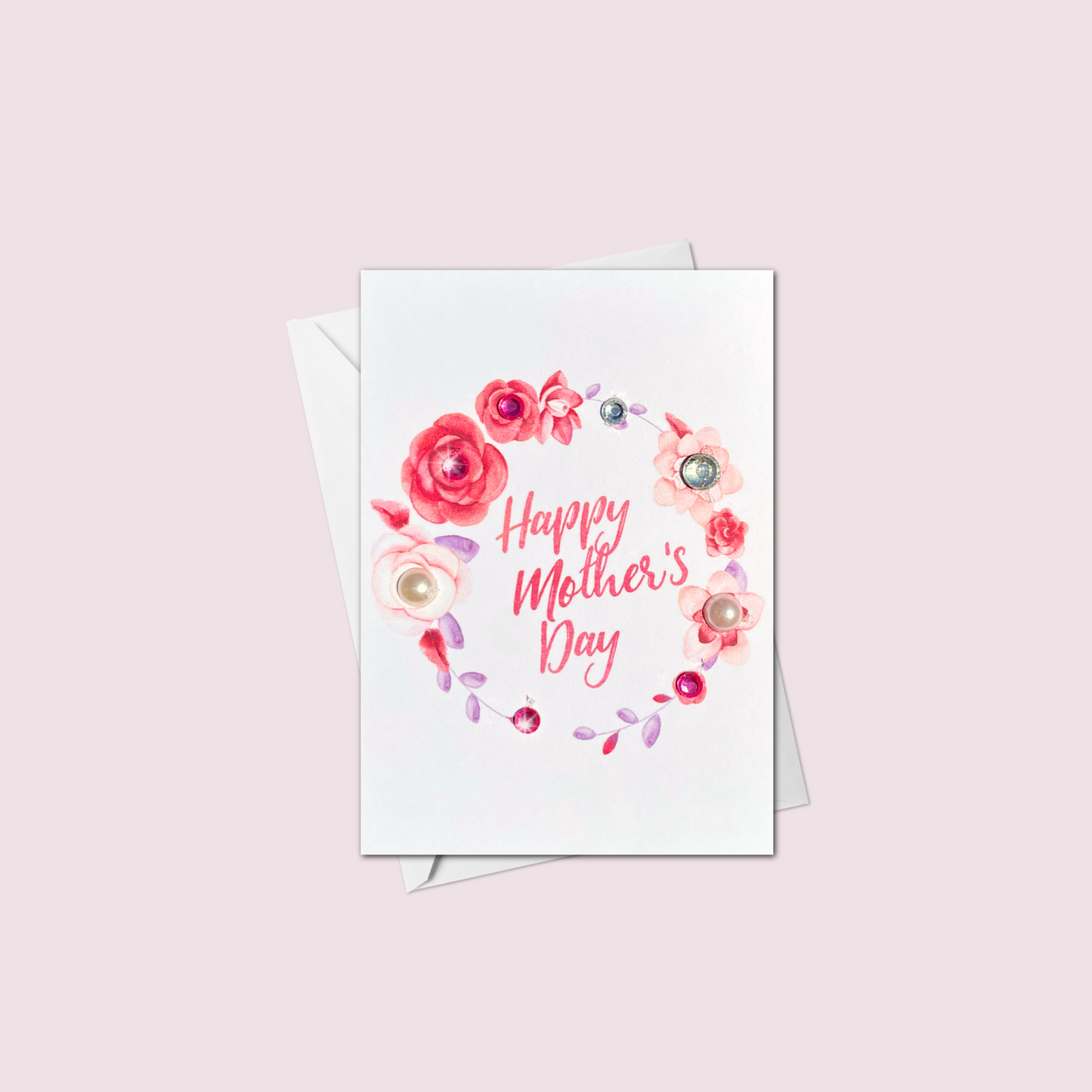 Mini handmade Mother's Day card featuring a watercolor floral wreath with jewel and pearl accents, Happy Mother's Day text, made in Canada.